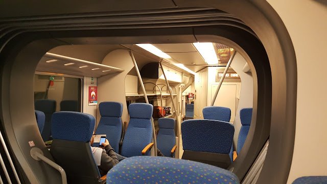 COMO IR DO AEROPORTO DE MALPENSA PARA HOTÉIS PRÓXIMOS DE MILANO CENTRALE ? HOSPEDAGEM ECONÔMICA EM MILÃO Interior do Malpensa Express